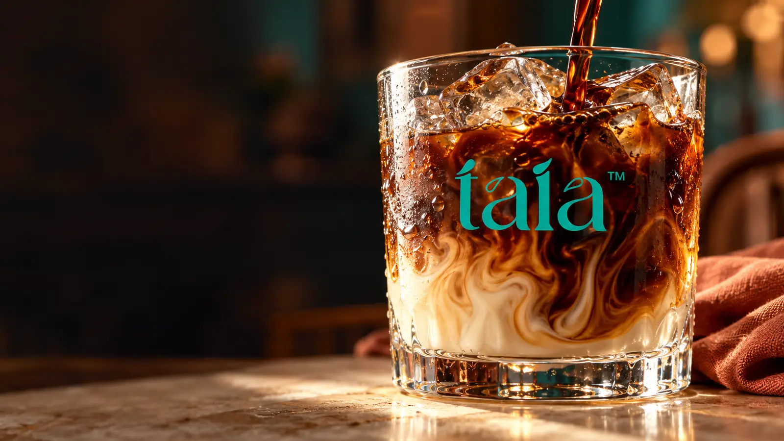 Vietnamese-style iced coffee being poured over ice